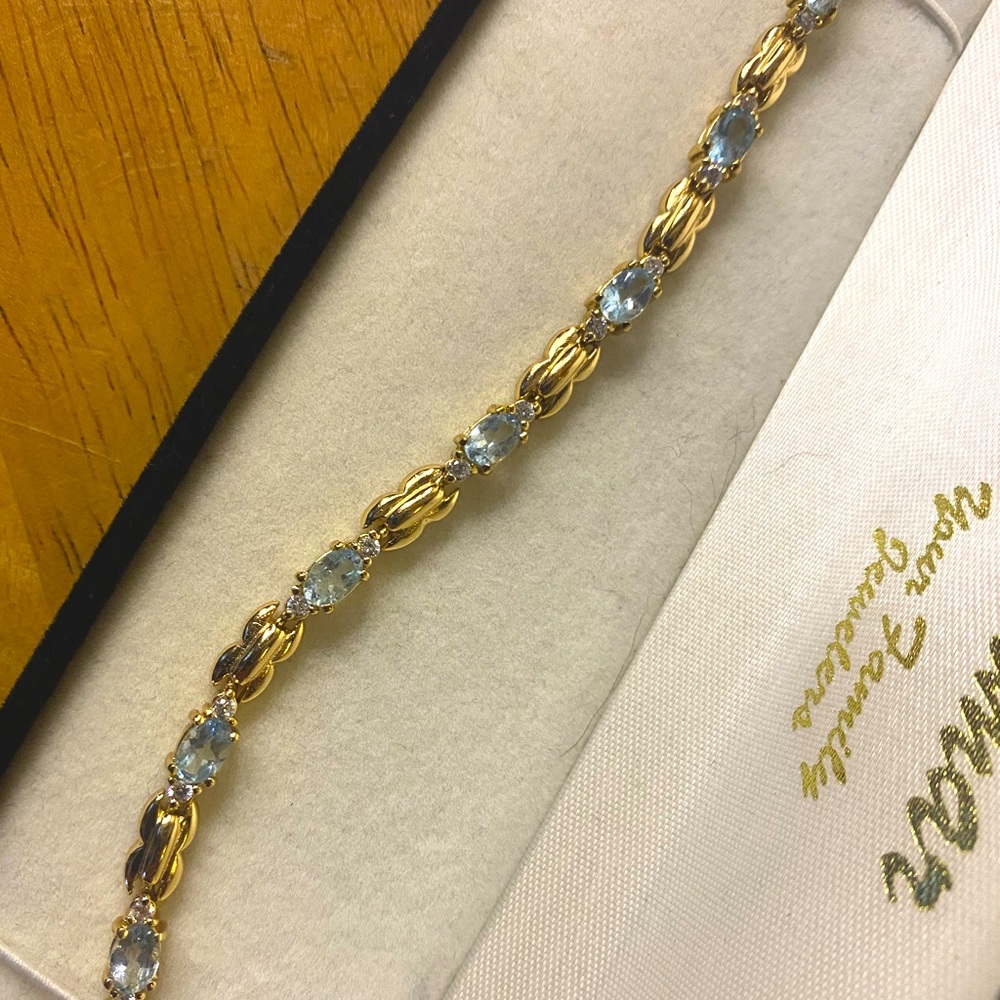 Gold and light blue bracelet